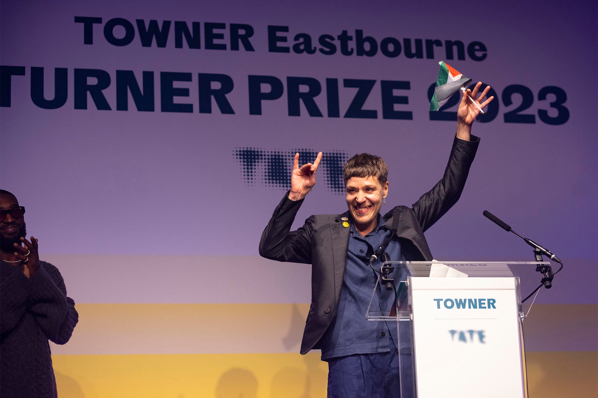 Turner prize winner Jesse Darling waves Palestinian flag during speech The Independent